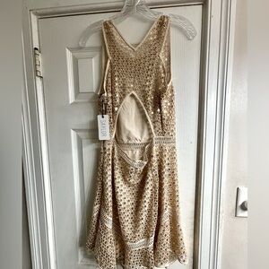 Fun,sparkle champagne colored dress with cut out in the back…